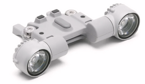 Angled view of DJI AL1 spotlight for Matrice 4 series showing lens and streamlined housing