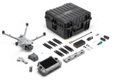 DJI Matrice 4TD NightTracker kit contents with RC Plus 2 controller, AL1 spotlight, charging hub, and hard case