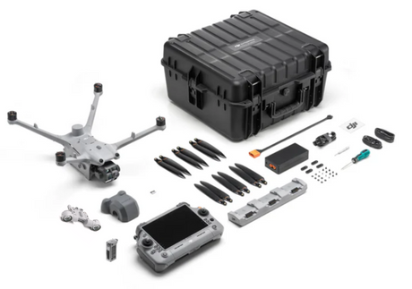 DJI Matrice 4TD NightTracker kit contents with RC Plus 2 controller, AL1 spotlight, charging hub, and hard case